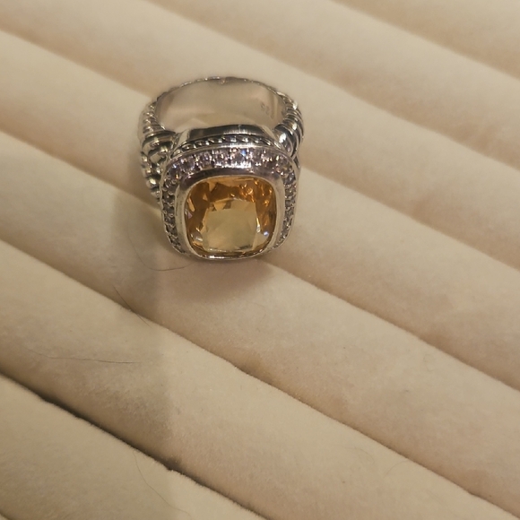 Elegant Silver and Yellow Gemstone Ring